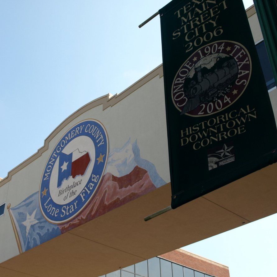 Historical Downtown Conroe TX, Montgomery County, Birthplace of the Lone Star Flag mural — divorce attorney Conroe TX