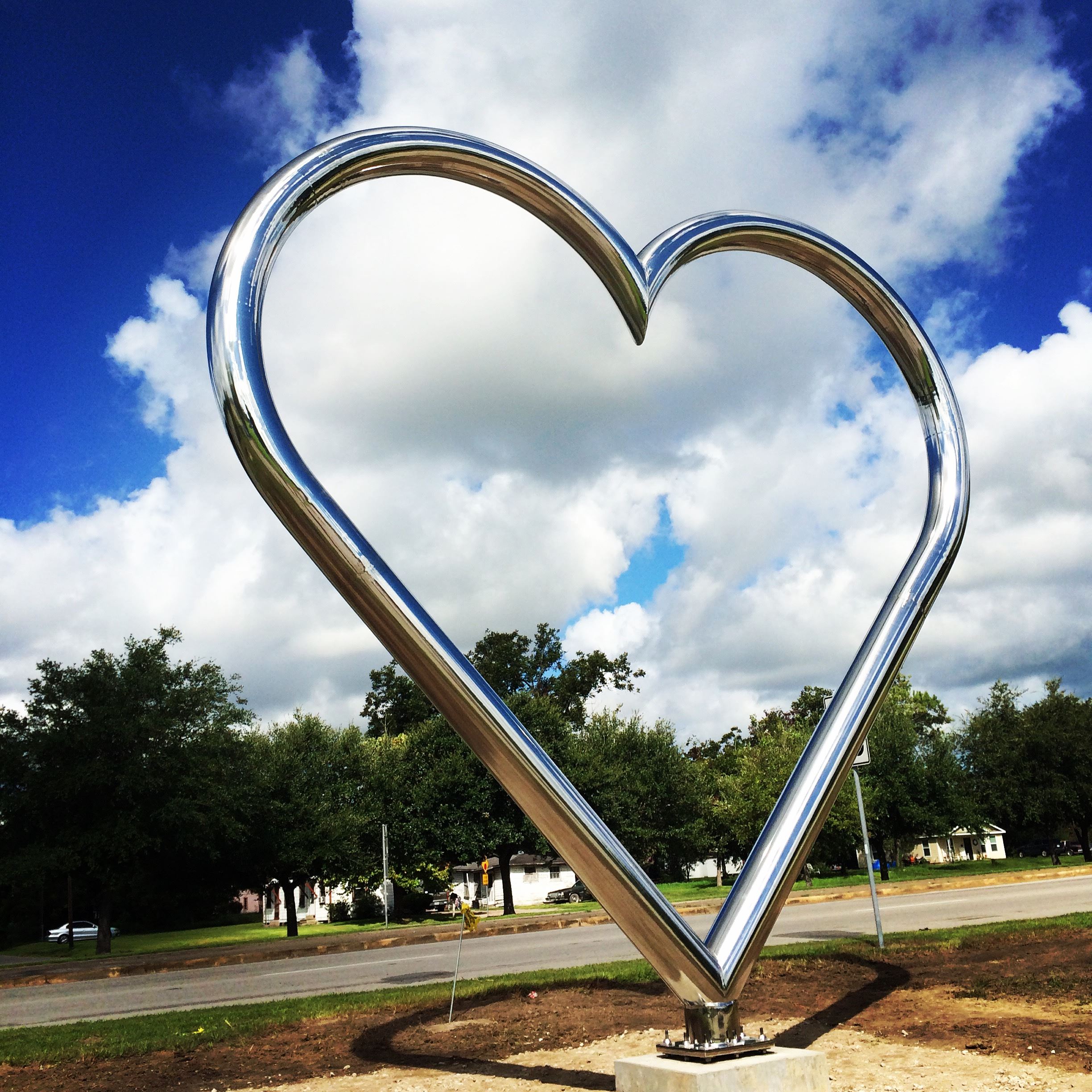 Heart of Brazoria County chrome sculpture in Angleton Texas — family law attorney Angleton TX