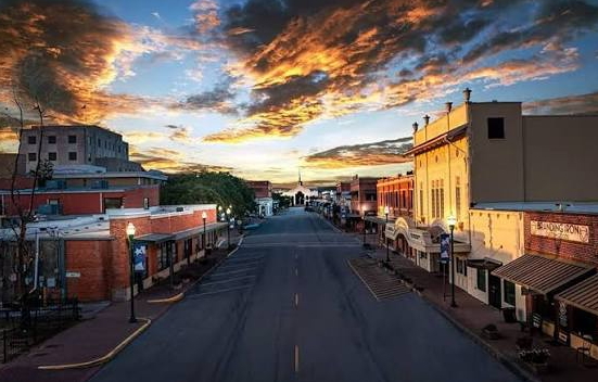 Historic downtown Conroe TX street at sunset, Montgomery County — child custody attorney Conroe TX